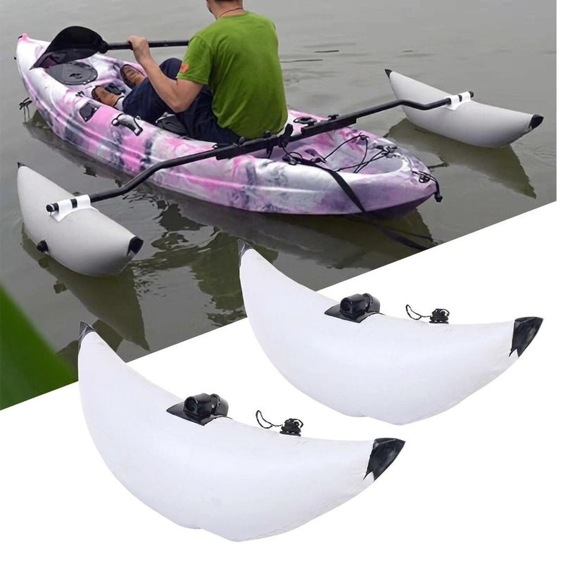 Kayak stabiliser floats mounted on both sides while paddling